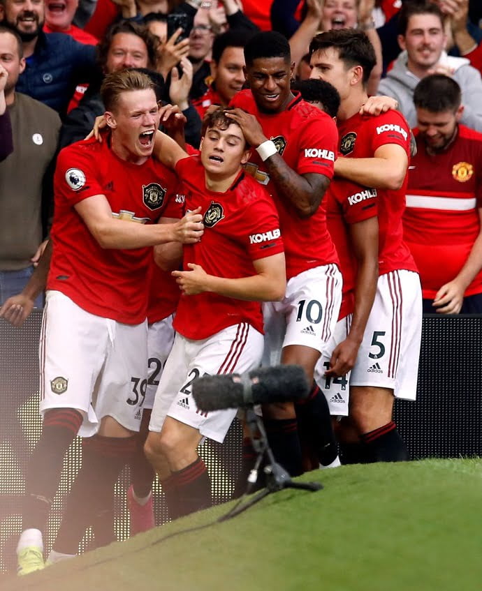 Daniel James celebrating